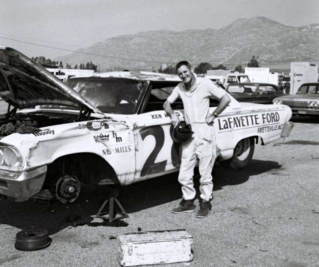 Ken-Miles-posing-besides-a-car